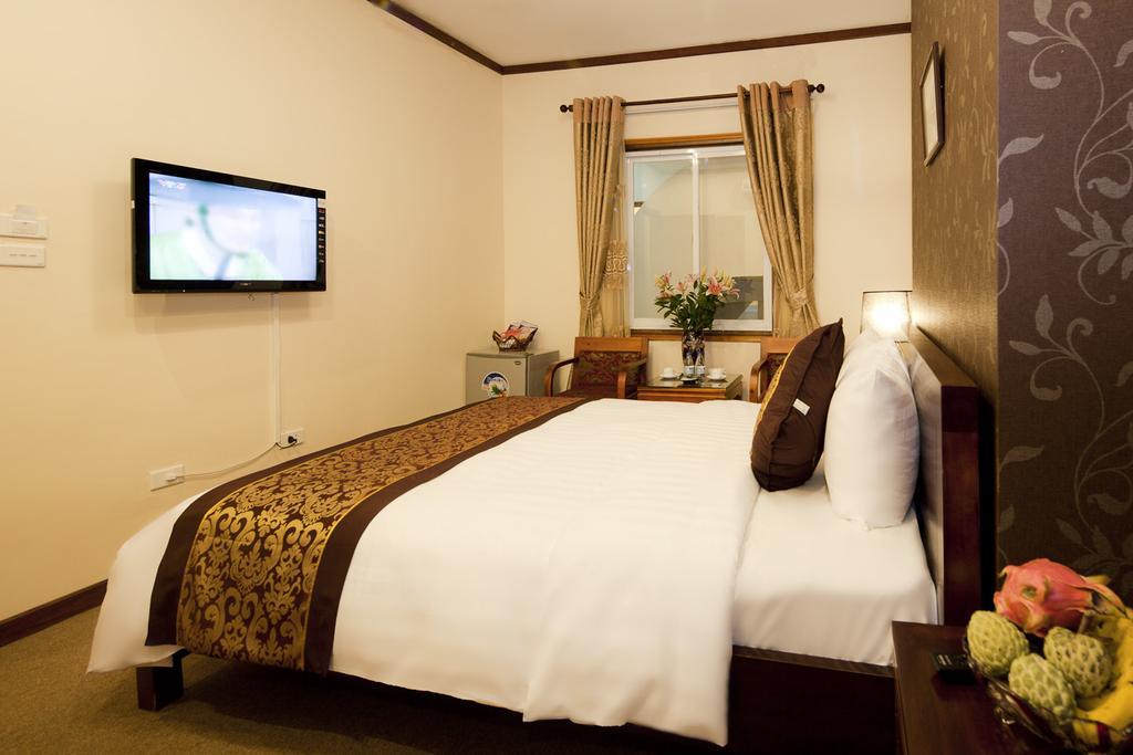 Hanoi Starlight Hotel Hanói Quarto foto